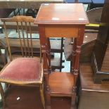 An Early 20th Century oak display cabinet; A 20th century oak lamp stand table (2)