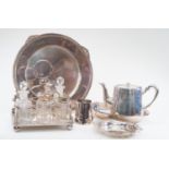 Group of silver plated items including a stand with four glass bottles, Walker & Hall entree dish,
