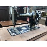 A Jones Treadel sewing machine.