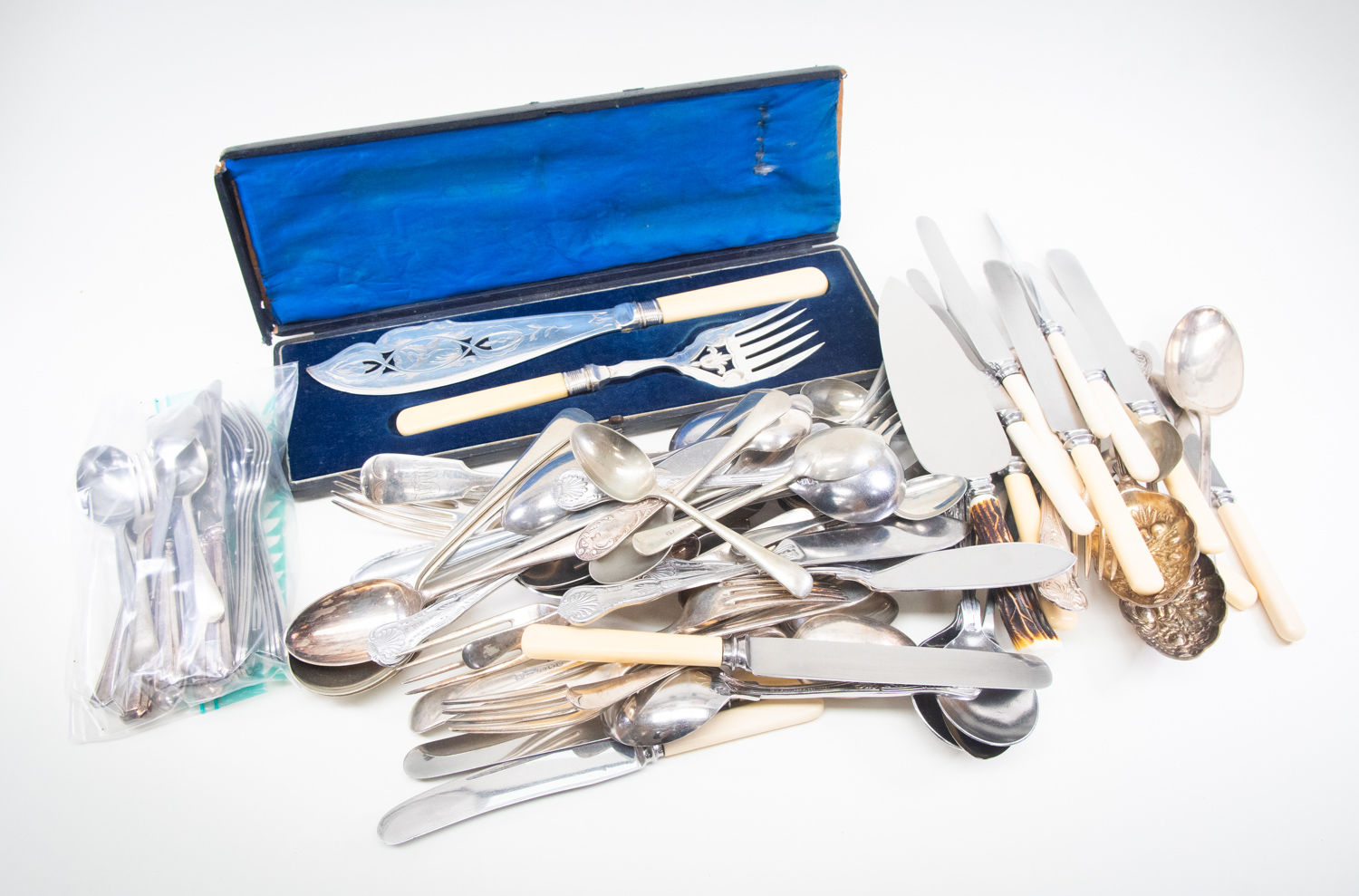 A collection of silver plated cutlery, quantity, together with assorted stainless steel cutlery (1