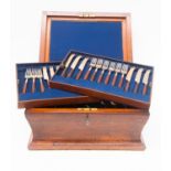 A 19th Century mahogany deed box with key, converted to a canteen of cutlery with stacking trays