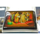 A Fedoskino Pegockuno Russian black lacquered papier mache box, of rectangular form with hinged lid,