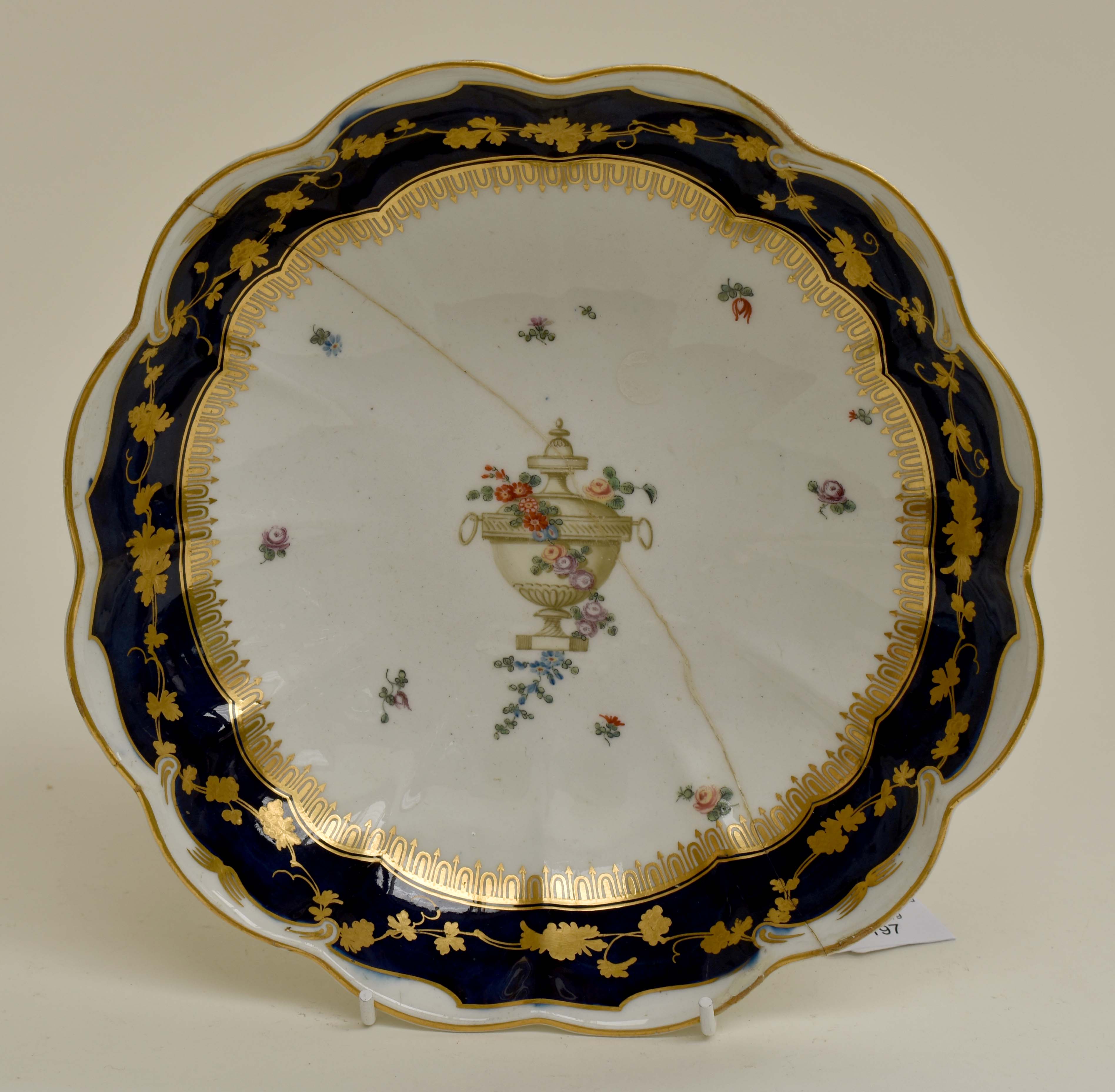 A Derby porcelain dessert bowl, circular, lobed form, circa 1775, central polychrome urn with floral - Image 2 of 2