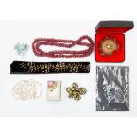 A collection of costume jewellery to include an Edwardian black velvet choker with bead