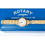 A 9ct gold ladies Rotary watch, enamel dial, Roman numerals, on later plated strap