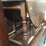 An 18th Century joined oak gateleg table .