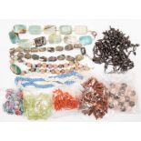 A collection of assorted gemstone necklaces, including a 20th Century coral single strand