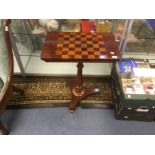 A Victorian mahogany games table with chequer top