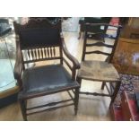 Rush seated ladder back chair and Edwardian leather seated arm chair in the Georgian style.