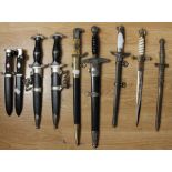 Eight reproduction Third Reich daggers to include two SS, two HJ, Navy etc (1 box)