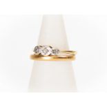 A 22ct gold band, size K, weight approx 3 grams along with an 18ct gold and diamond ring, size M,