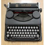 A George V Bar-Lock black cased typewriter, with a crest reading, by appointment to his majesty King