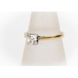 A diamond solitaire,  the round old cut diamond approx 0.50 carat, set within a square mount 18ct