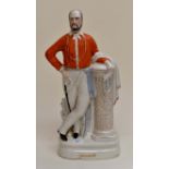 A 19th Century Staffordshire flatback figure of Garibaldi, circa 1870, standing next to a plinth,