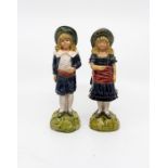 A pair of 19th century figures, possibly Belguim. Male figure with chip to hat and base, female