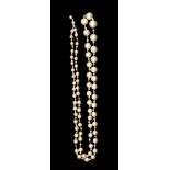 A pearl necklace comprising graduated alternate round pearl with seed pearl spacers a/f, clasp