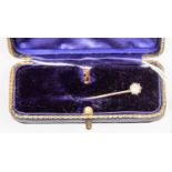 A paste set pin, unmarked 9ct gold, along with a unmarked rose metal pin component, combined total