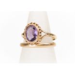 An amethyst and 9ct gold ring, size L1/2, along with a 9ct gold band, combined total gross weight