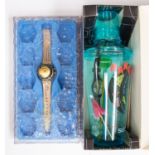 Swatch- two retro Swatch watches to include a  Champagne cork 'Sparkling Life' limited edition,