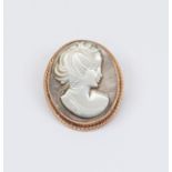 A 9ct oval mother of pearl cameo brooch