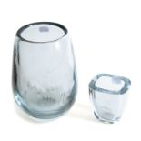 Two unsigned Scandinavian glass vases, the larger with etched deer, clear glass with blue tint,