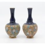 Pair Royal Doulton vases (blue & gold). Impressed marks to base. Height 12.5cm (2)