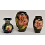 A lovely Moorcroft collection to include; a late 20th Century Lily vase with a green background,