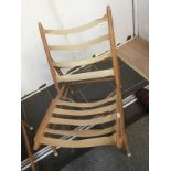 Three 1970's Ercol style easy chairs, no covers