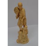 A Japanese ivory okimono of a fisherman and an infant, Meiji period, 1868-1912, signed, height 21cm