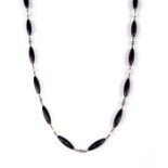 Mont Blanc - a silver, onyx and mother of pearl necklace, torpedo shaped elongated onyx beads