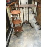 Late 19th century tilt top tripod table together with a pitch pine tilt top tripod table and cake