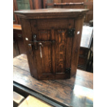 A Rupert Griffiths Solid Oak Carved Corner cabinet