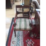 Two wooden armchairs with Regency style upholstery