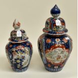 Two 19th Century Chinese jars with lids, one approx 29 cms high, the other 39 cms high approx A/F
