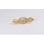 An Edwardian diamond and pearl set brooch,  unmarked yellow metal gold, assessed as 15ct, length