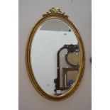 Four 20th Century oak and gilt wall mirrors