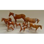 A large group of Beswick palomino horses and foals (9) A/F