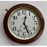 A vintage Bennetts 8 day car /travel clock, subsidiary dial