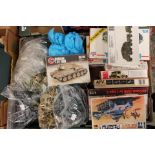 A collection of military WWII plastic kits plus assorted soldiers in 00 Scale and 1/32 scale (1