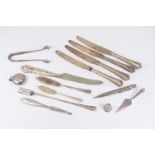 Collection of silver flat wares including; sugar tongs, a silver sovereign case Birmingham 1895