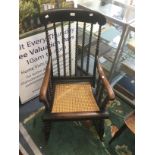 19th Century oak cane seat rocking chair, heavily turned