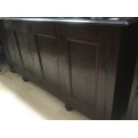 Oak sideboard with one central drawer and two cupboard doors