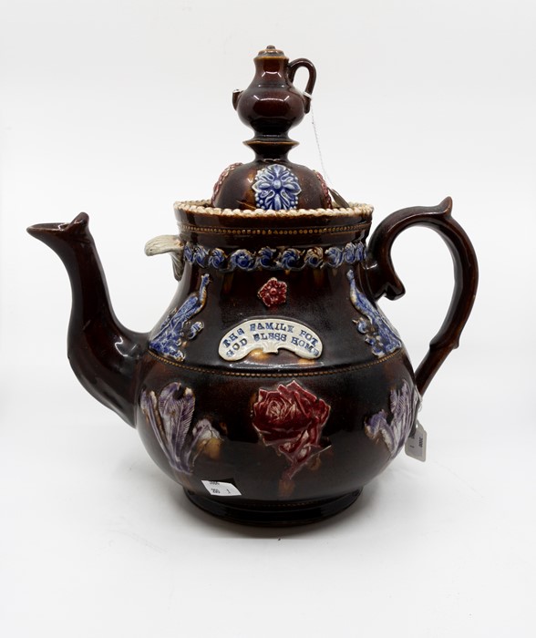 A Bargeware teapot with coffee pot finial (spout brokers but present), applied roses, Prince of