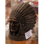 A Guy Motors Ltd "Feathers in our cap" Indian head desk ornament.