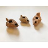 reoffer Etwall ac - 40-60 A group of three Roman terracotta oil lamps, 2nd-3rd Century AD,