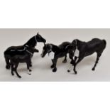 Four John Beswick black horses including Black Beauty, Fell pony and Dales