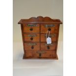 An Edwardian treen set of spice drawers