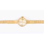 A Smiths 9ct gold ladies watch, textured strap, dial diameter approx 14mm,  length of strap 19cm,