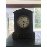 A Victorian slate bracket timepiece, enamel Roman dial (pendulum)