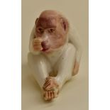 A Royal Worcester netsuke modelled as an Ape, green stamp, dated circa 1913, approx 7cms